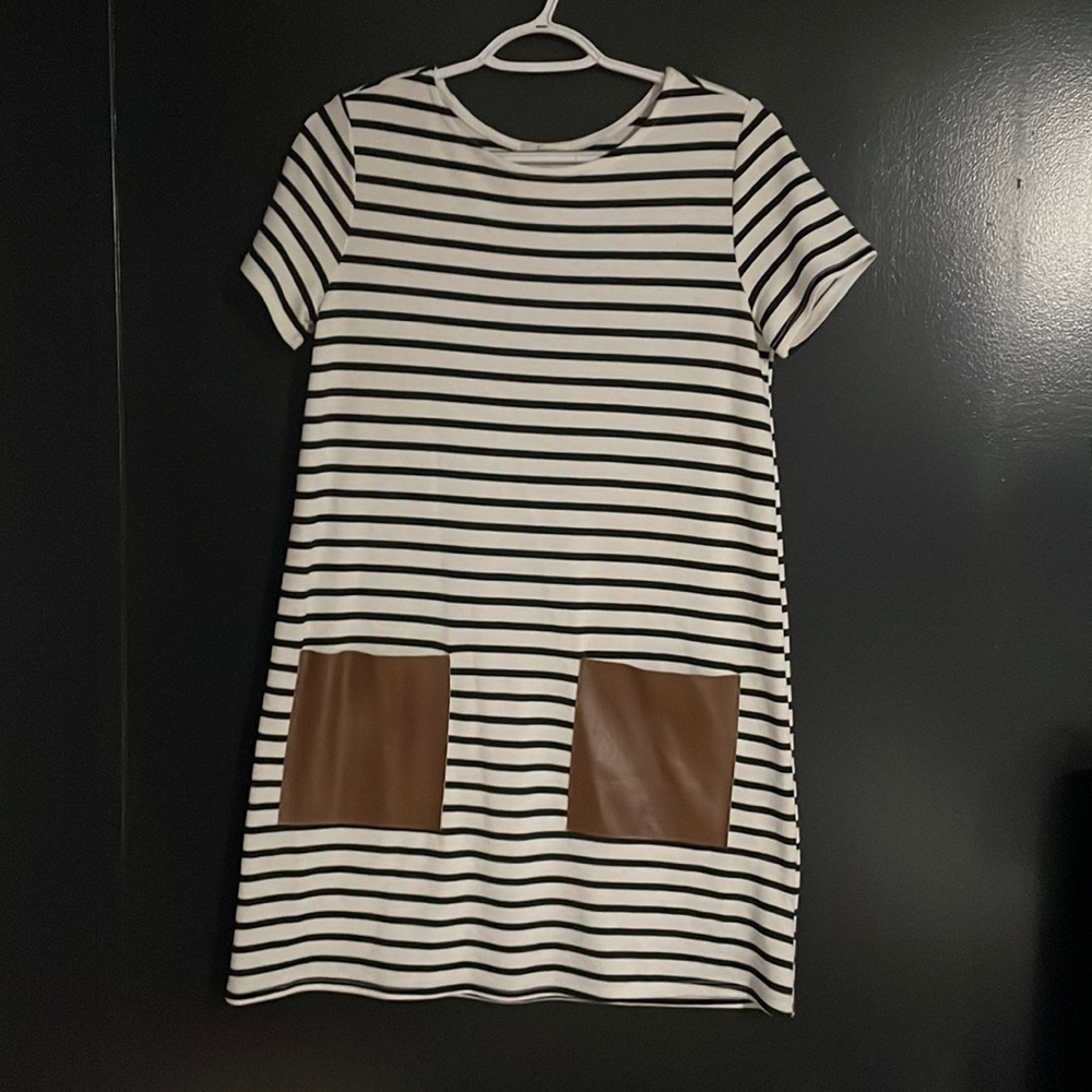Striped dress with faux leather pockets